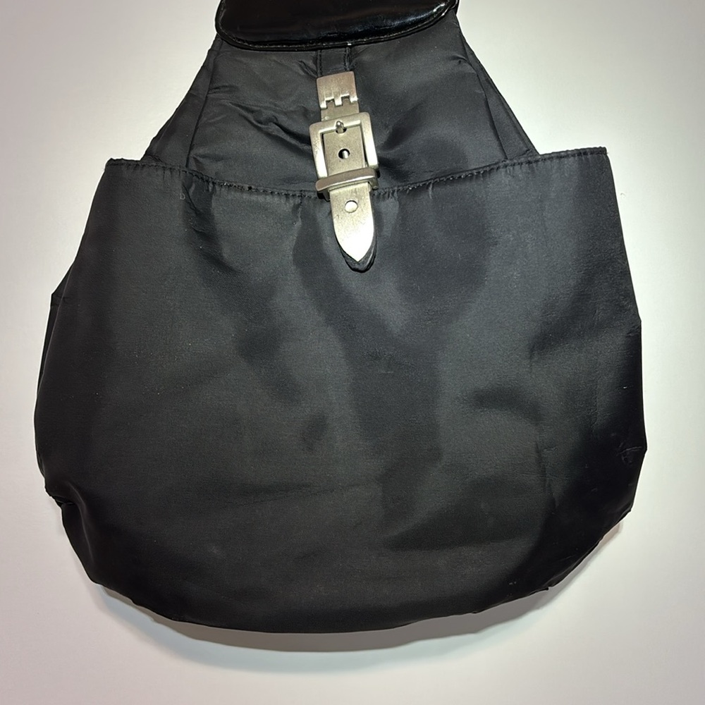 Jeanne Lottie black convertible nylon and vegan patent leather bag/backpack